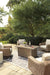 Beachcroft Beachcroft Fire Pit Table with Four Nuvella Swivel Lounge Chairs - Smart Rent To Own (PA) - Multi Location